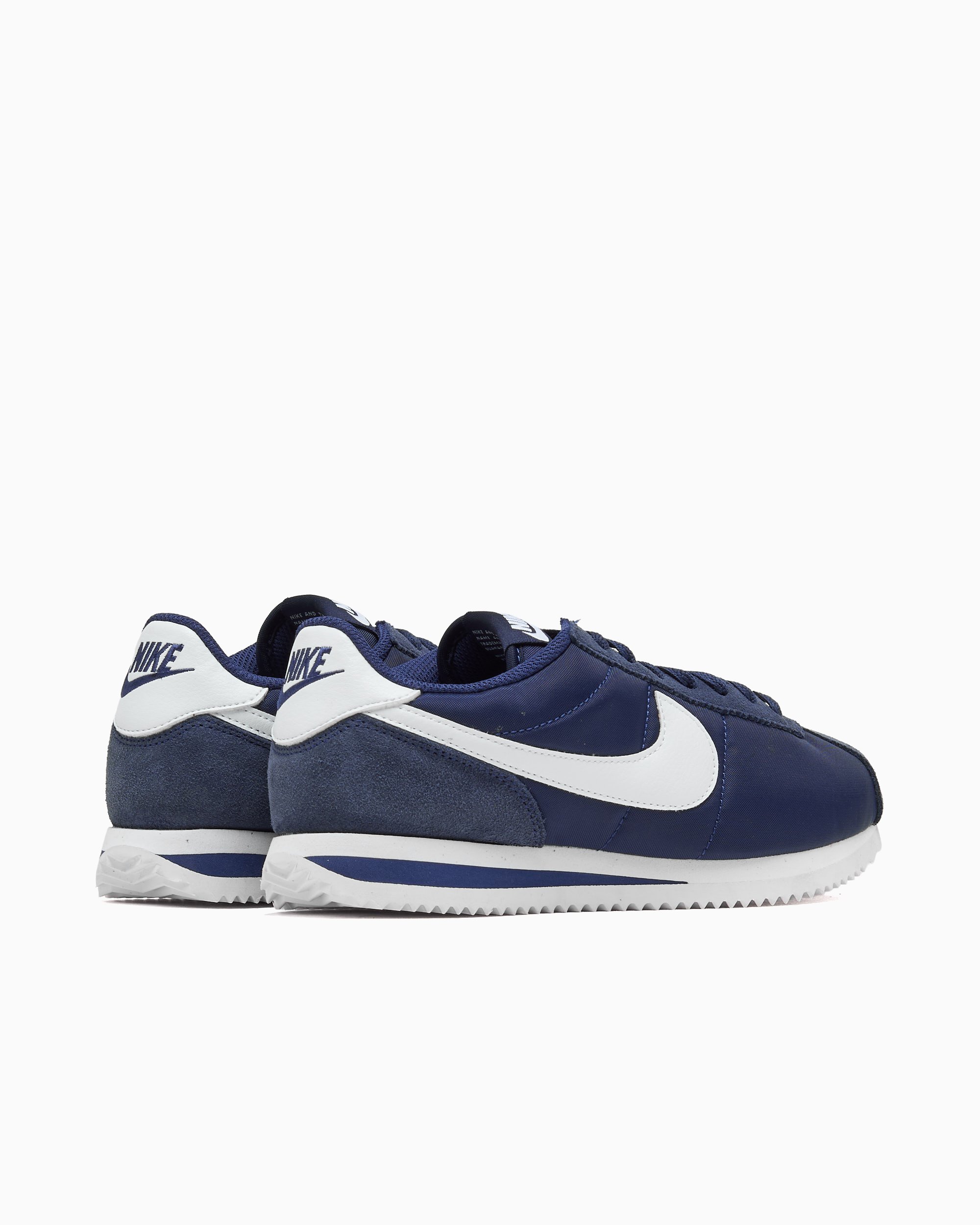 blue nike cortez leather