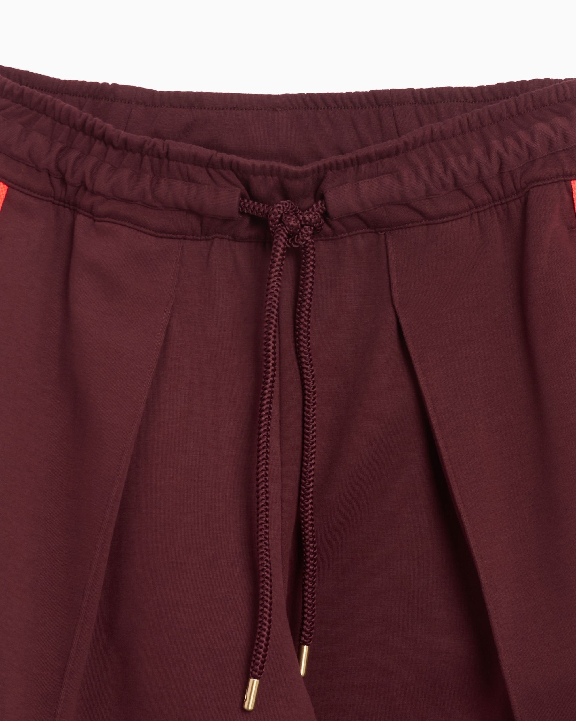 Burgundy nike pants womens 2025