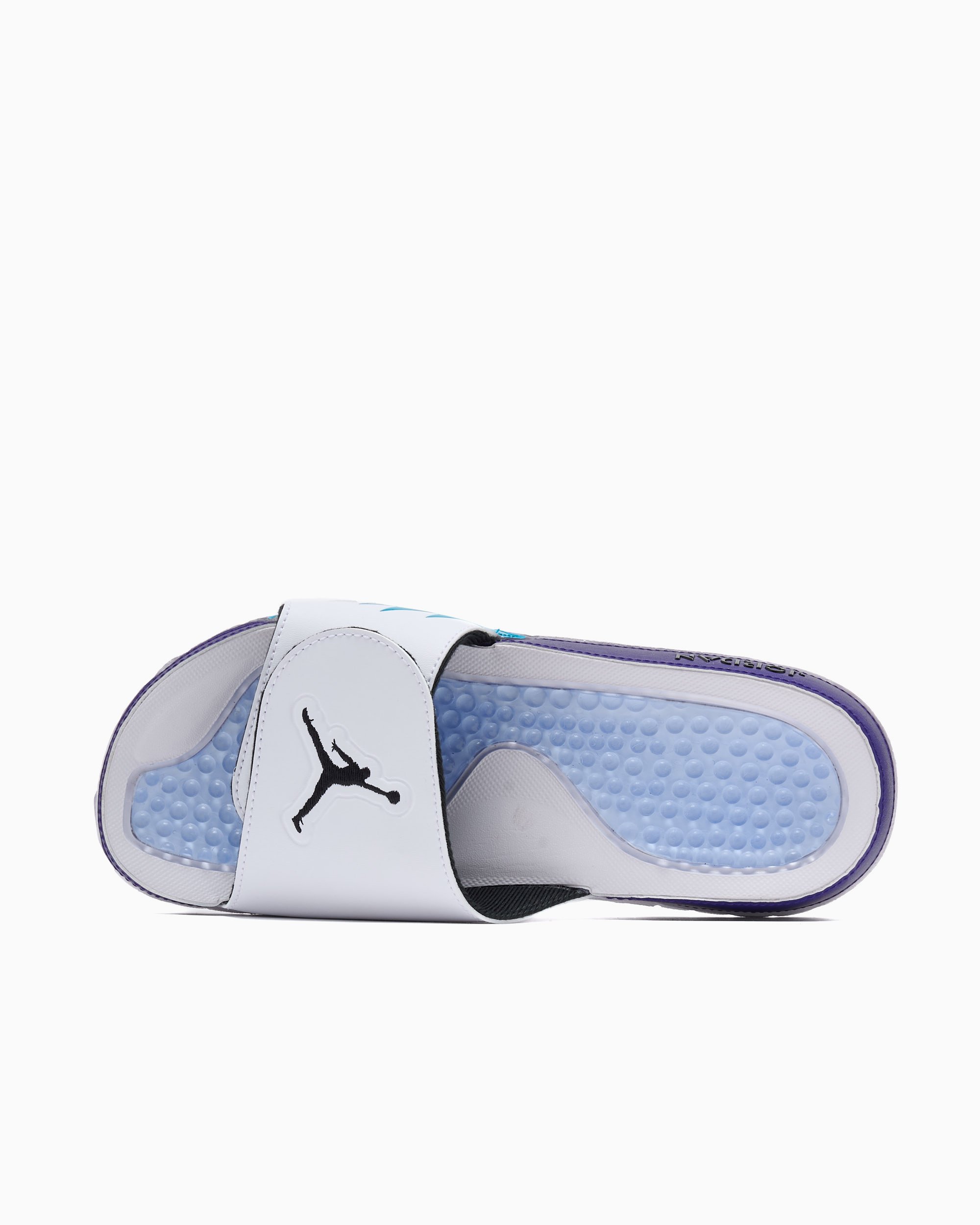 white and blue jordan slides