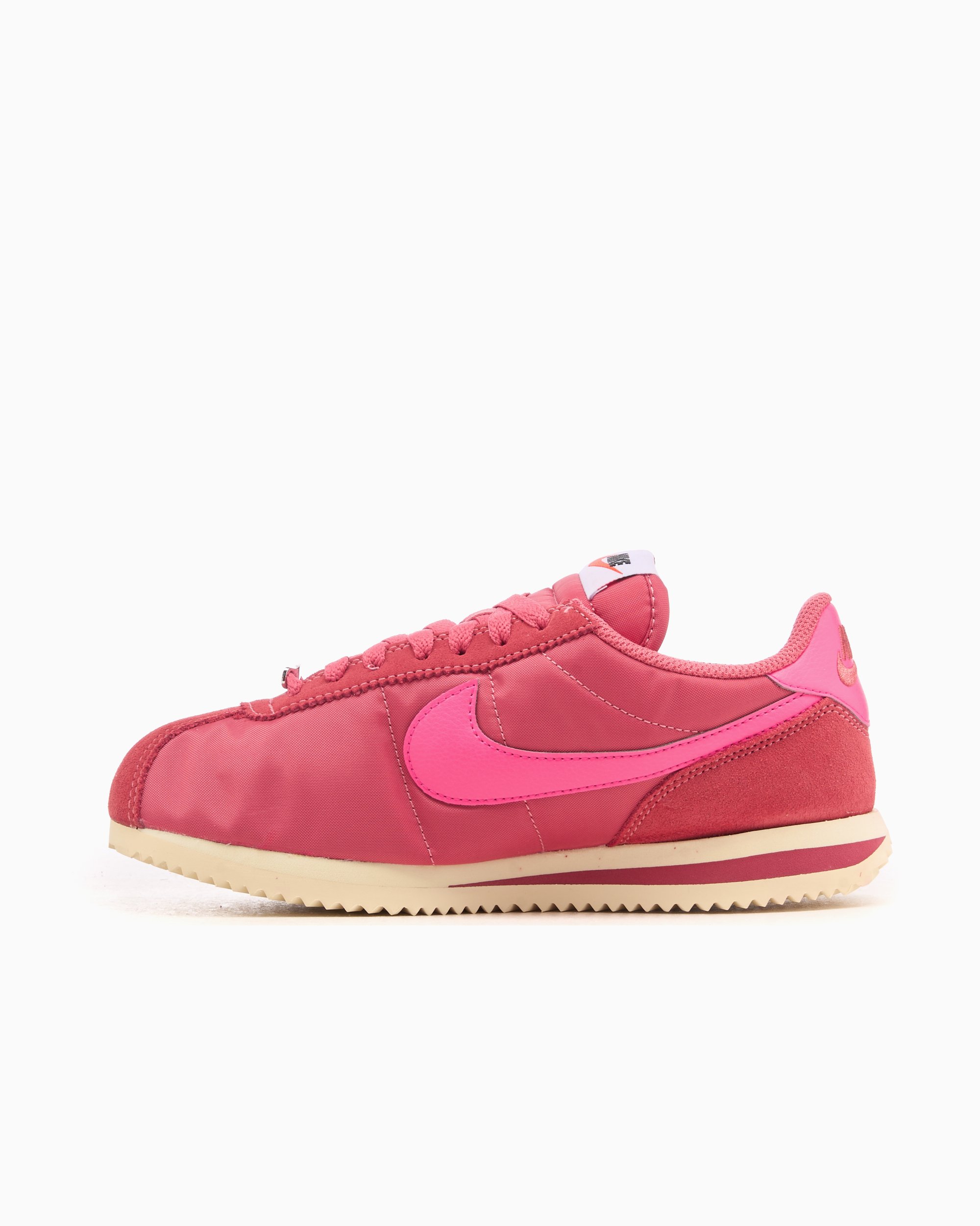 black and pink nike cortez