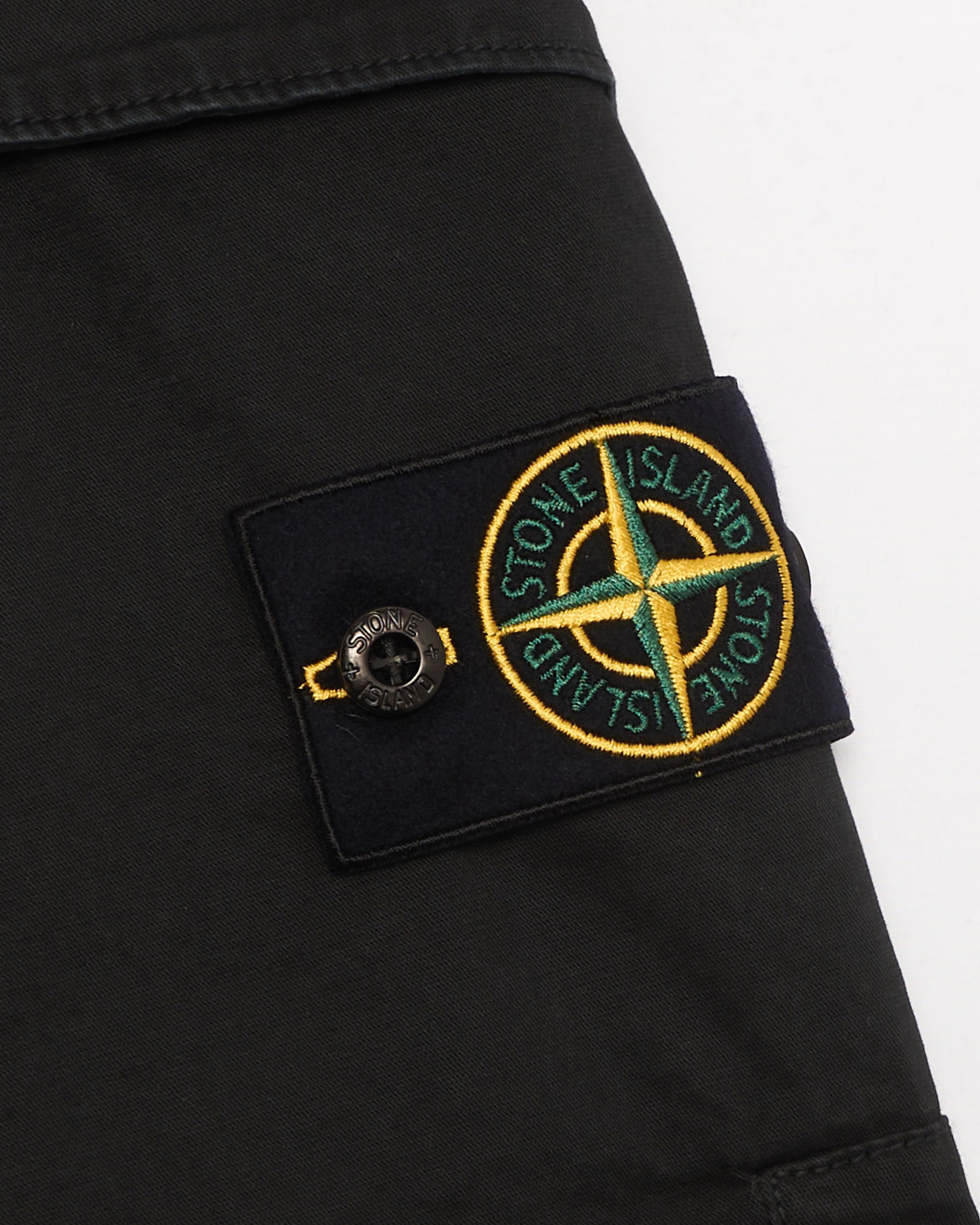 Stone island badge shorts top