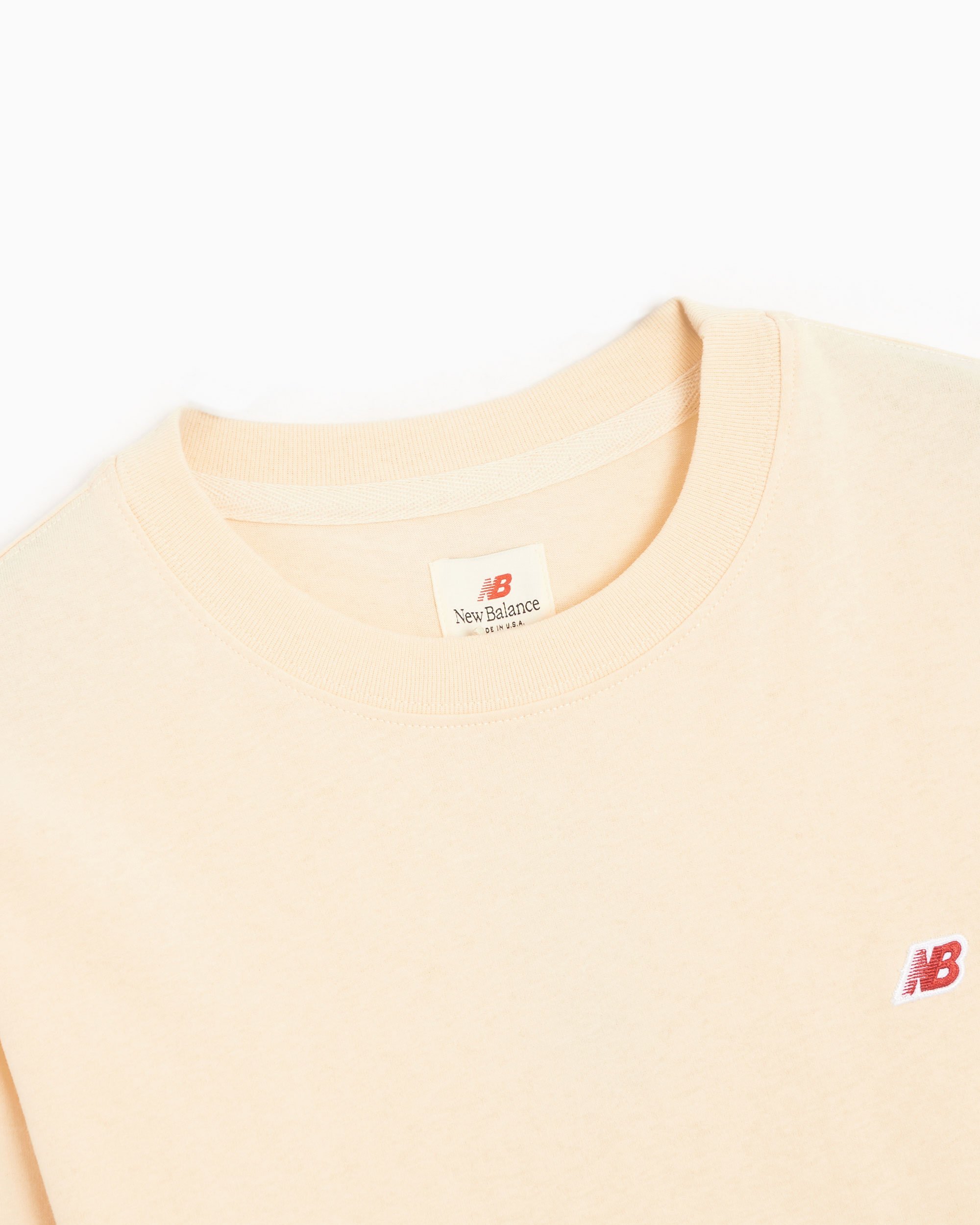 New Balance Made in USA Men s Core Long Sleeve T Shirt Orange MT21542 MCU FOOTDISTRICT