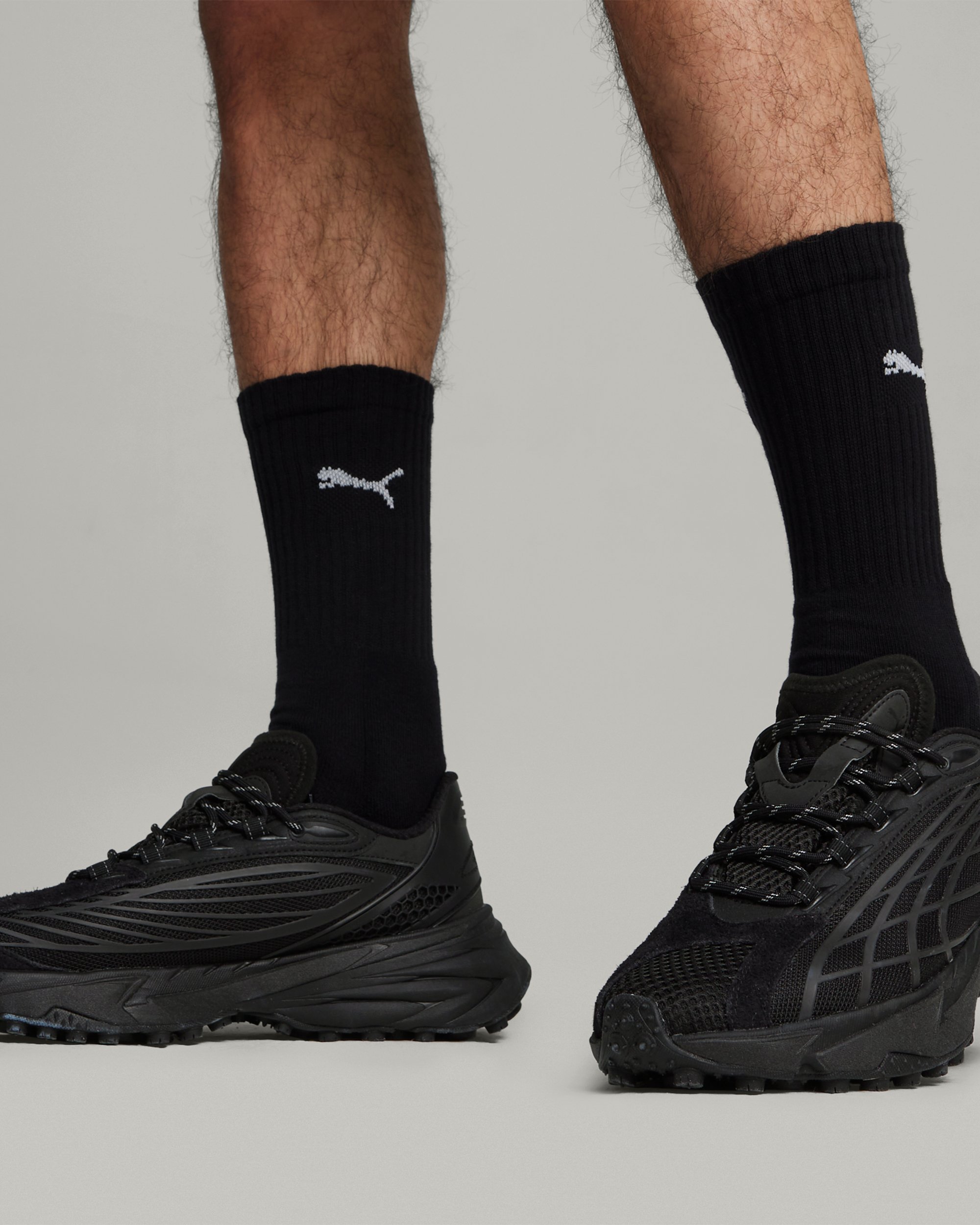 Puma black sale feet
