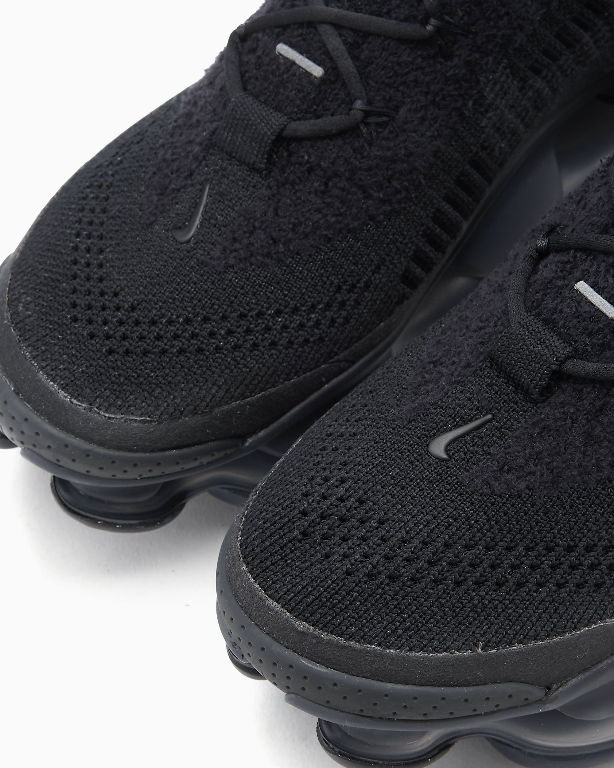 Nike Women s Air Max Scorpion Flyknit Triple Black Black DJ4702 002 FOOTDISTRICT