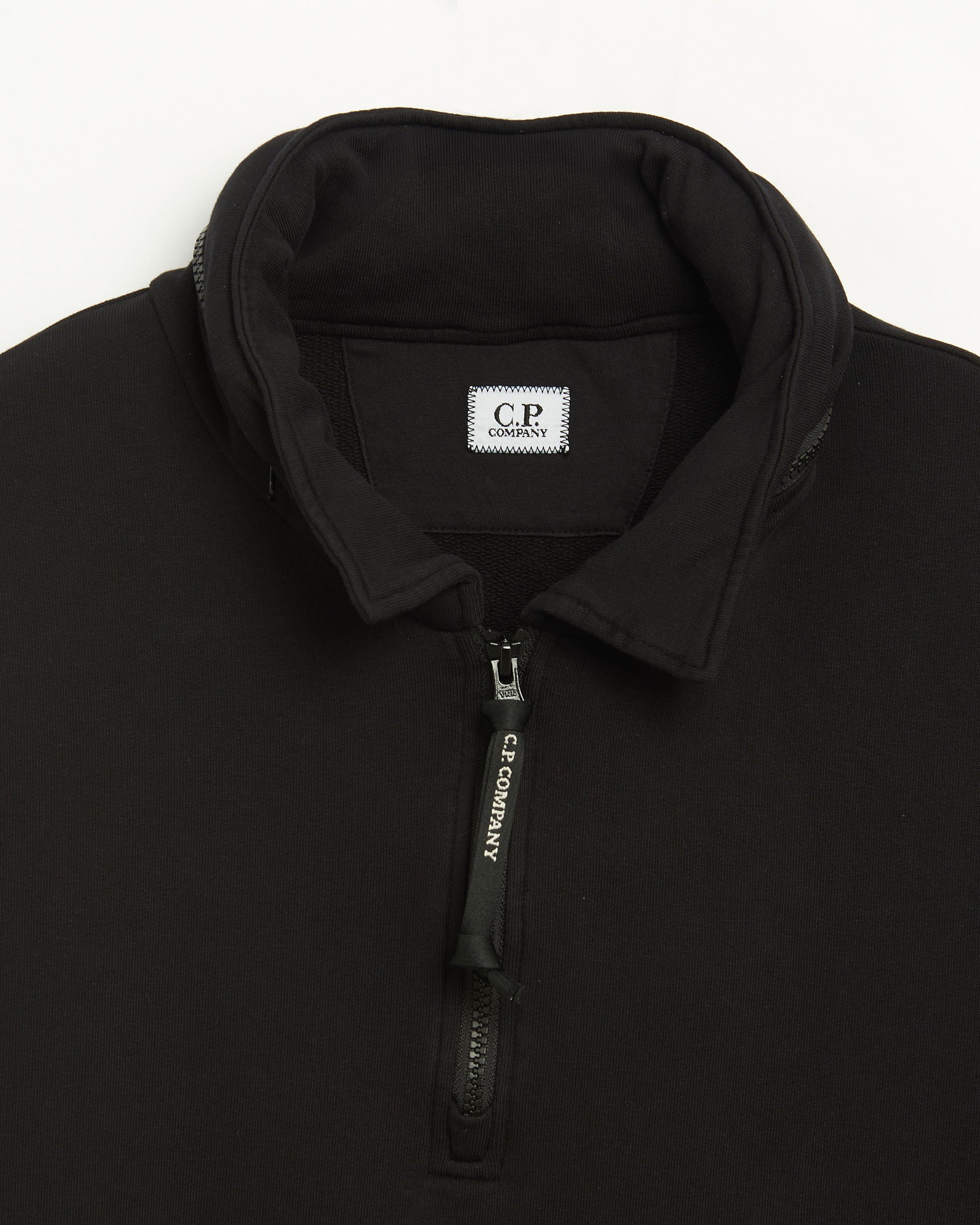 CP Company Men's Half Zip Polo Hoodie Black 16CMSS019A110039G-999 |  FOOTDISTRICT