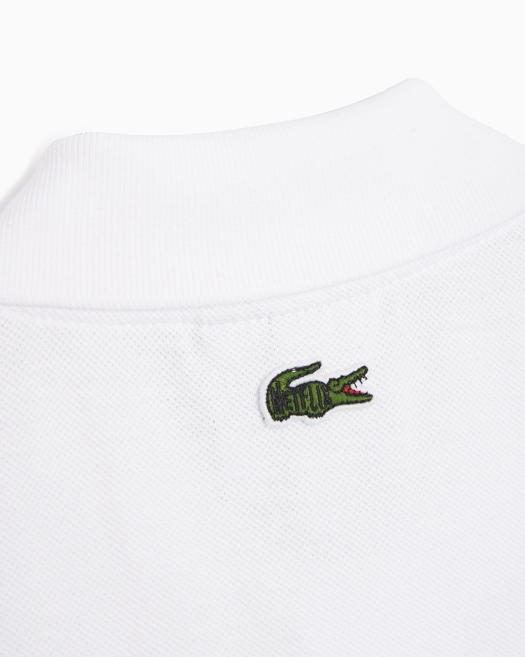 Lacoste x Netflix Men s Polo Elite Blanco PH7057 00 VIN FOOTDISTRICT