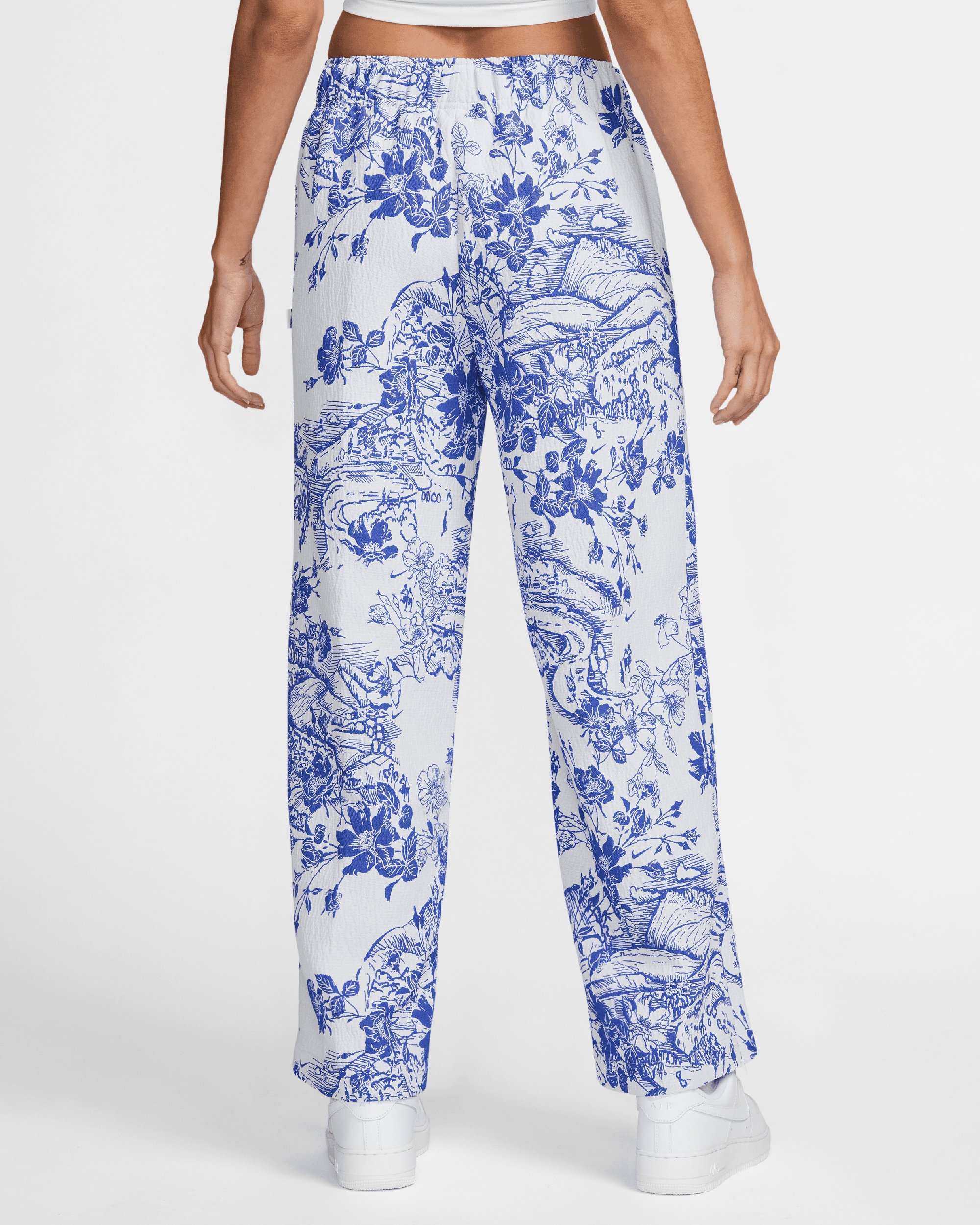 Nike Sportswear Collection Women s Jacquard Track Pants Blue HF9588 100 FOOTDISTRICT