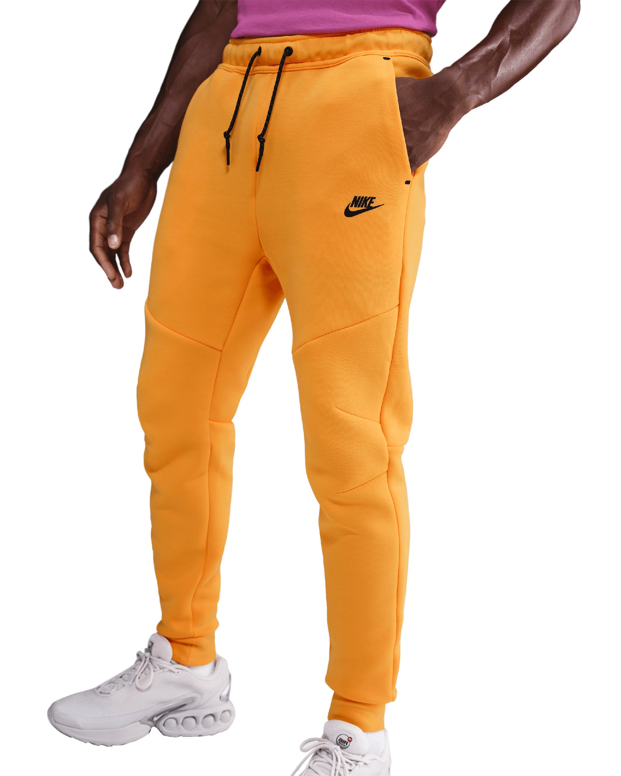 nike track pants yellow