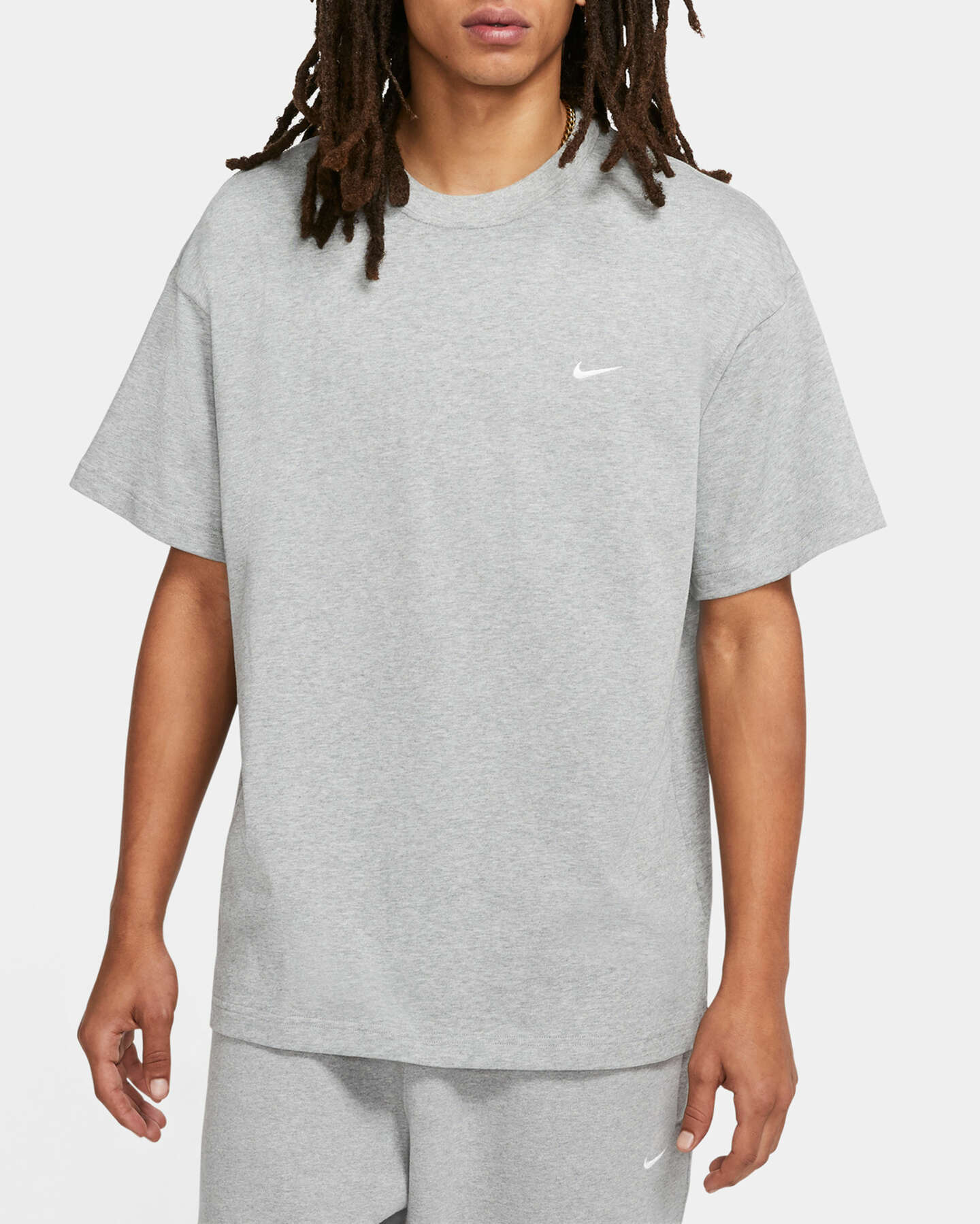 Nike NRG Solo Swoosh Men s Short Sleeve T Shirt Gris CV0559 063 FOOTDISTRICT