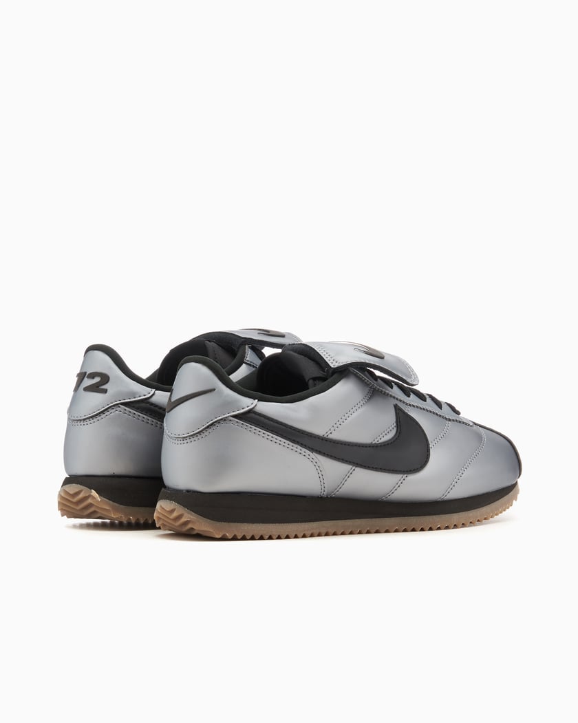 Silver cortez nike on sale