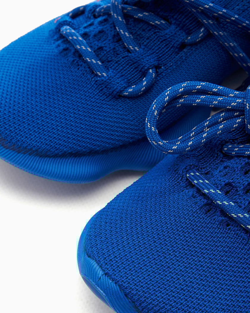 Scarpe human race uomo blu 2025