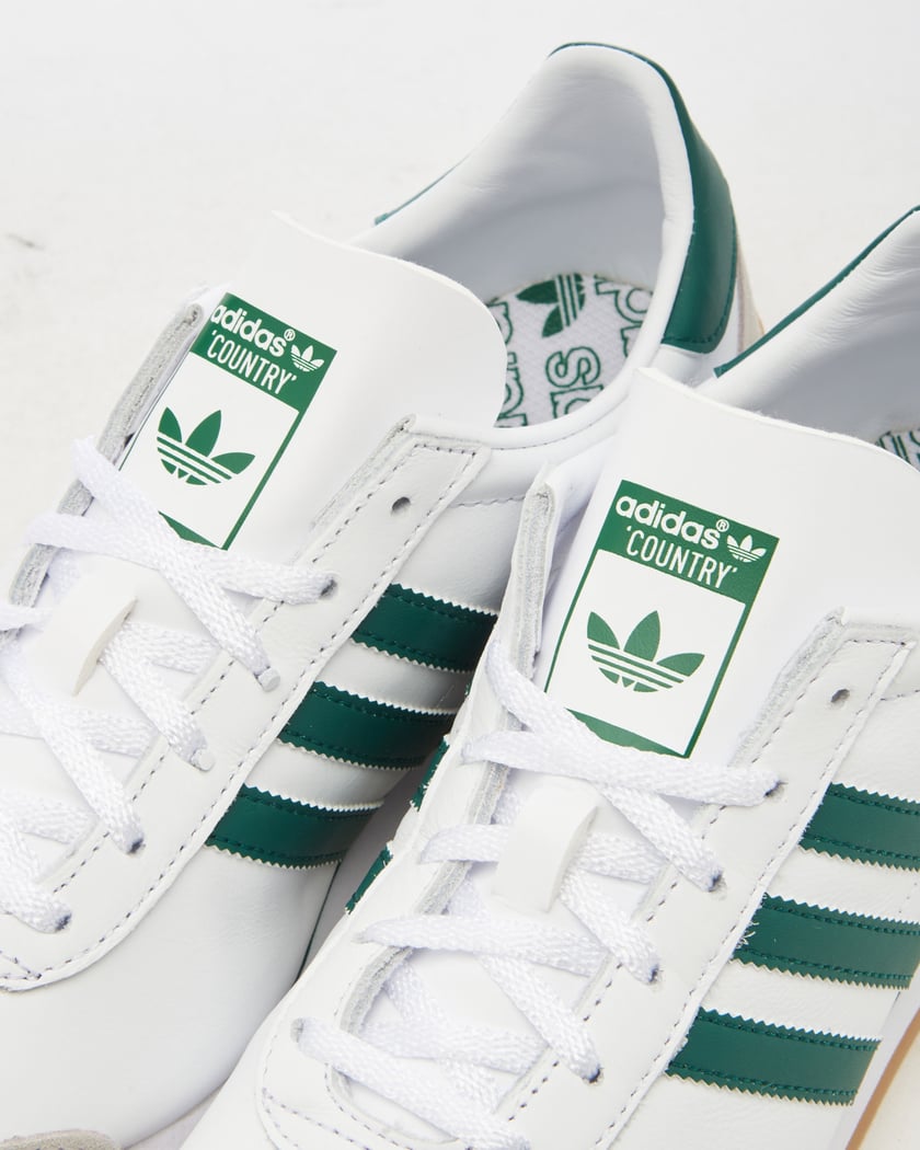 White and green adidas sneakers discount