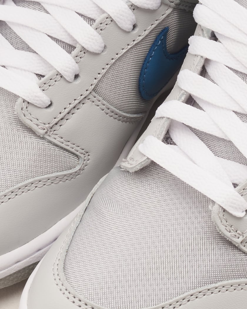 Nike Dunk Low QS Silver Blue Grau HF0391 001 FOOTDISTRICT