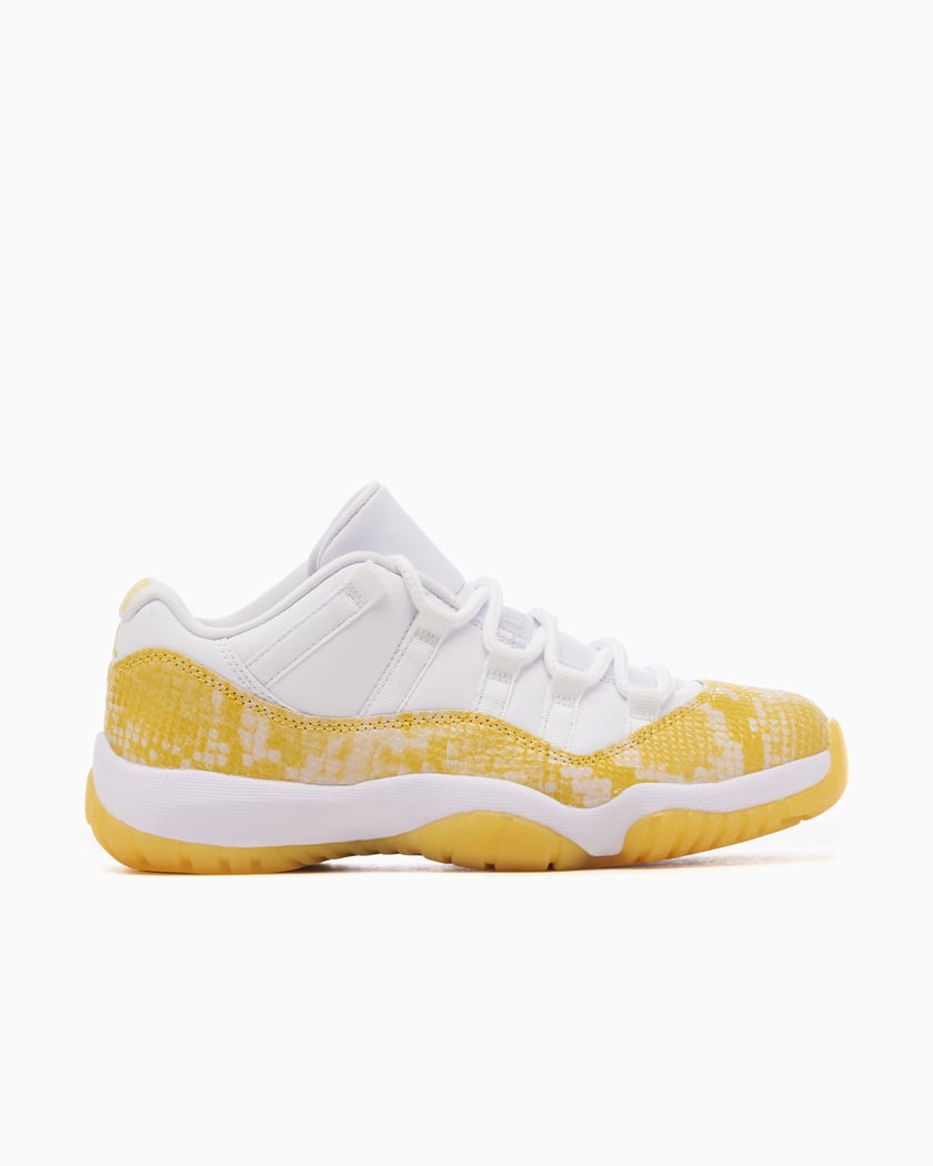 Air Jordan Women s 11 Retro Low Yellow Snakeskin White AH7860 107 FOOTDISTRICT
