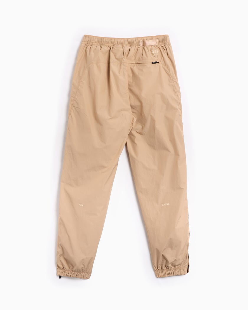 Nike x Drake NOCTA NRG Men s Woven Track Pants Beige FN7668 200 FOOTDISTRICT