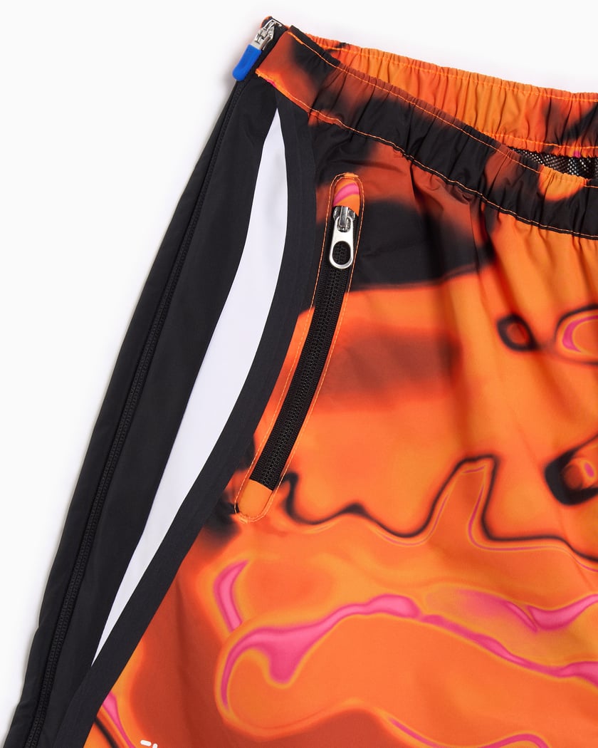 black and orange nike track pants