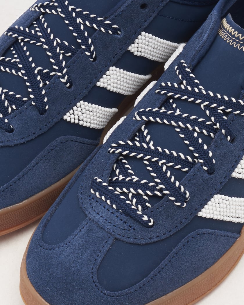 Blue leather adidas trainers top
