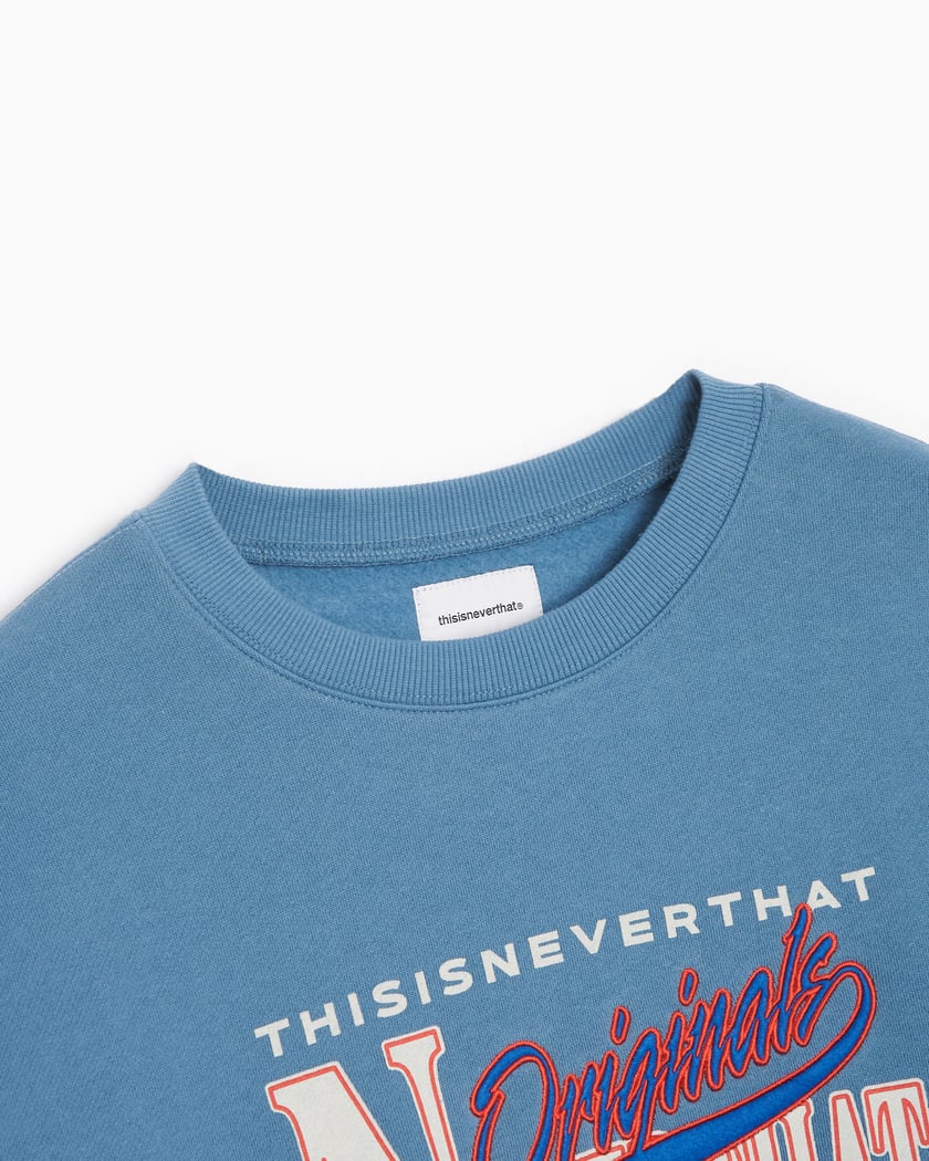 ★thisisneverthat★ that Village Tee Blue TN251TTSST33BLU This Is Never That Village Tee Blue - Calico Club