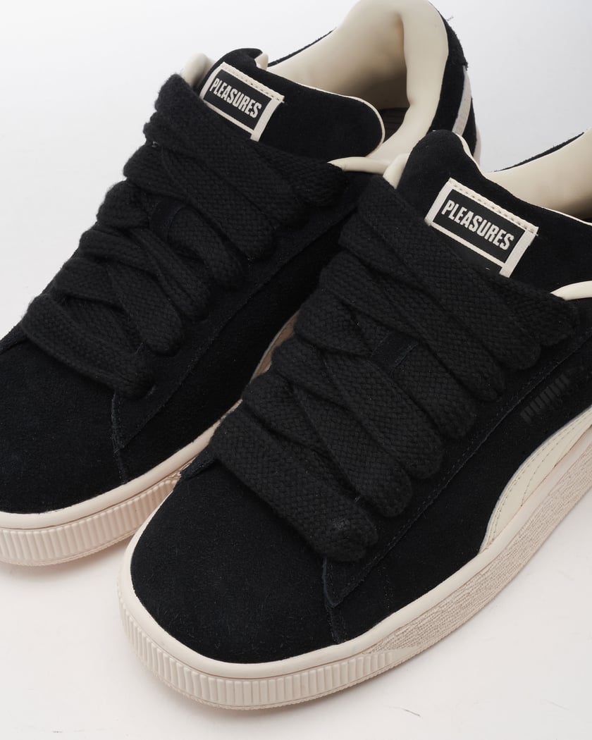 Puma suede black sale with white laces