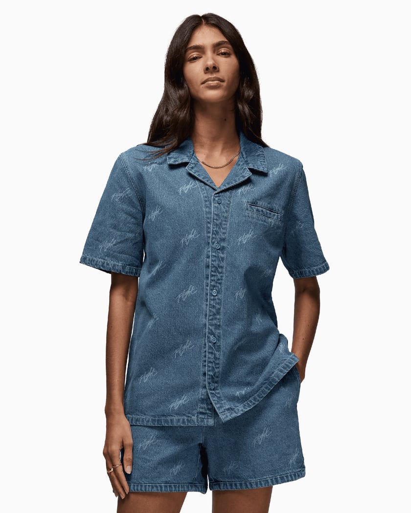 Jordan Women s Woven Short Sleeve Shirt Blue FN5769 453 FOOTDISTRICT