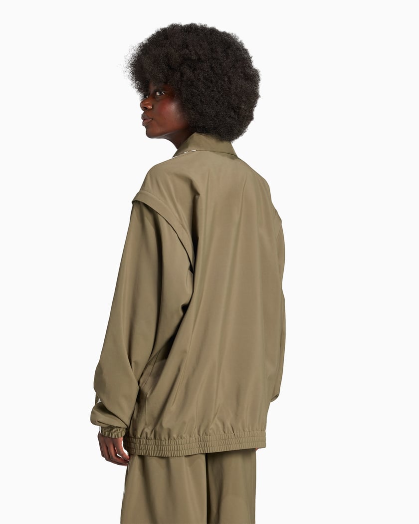 adidas Originals Adilenium Women s Oversized Zip Off Track Jacket Green JM9252 FOOTDISTRICT